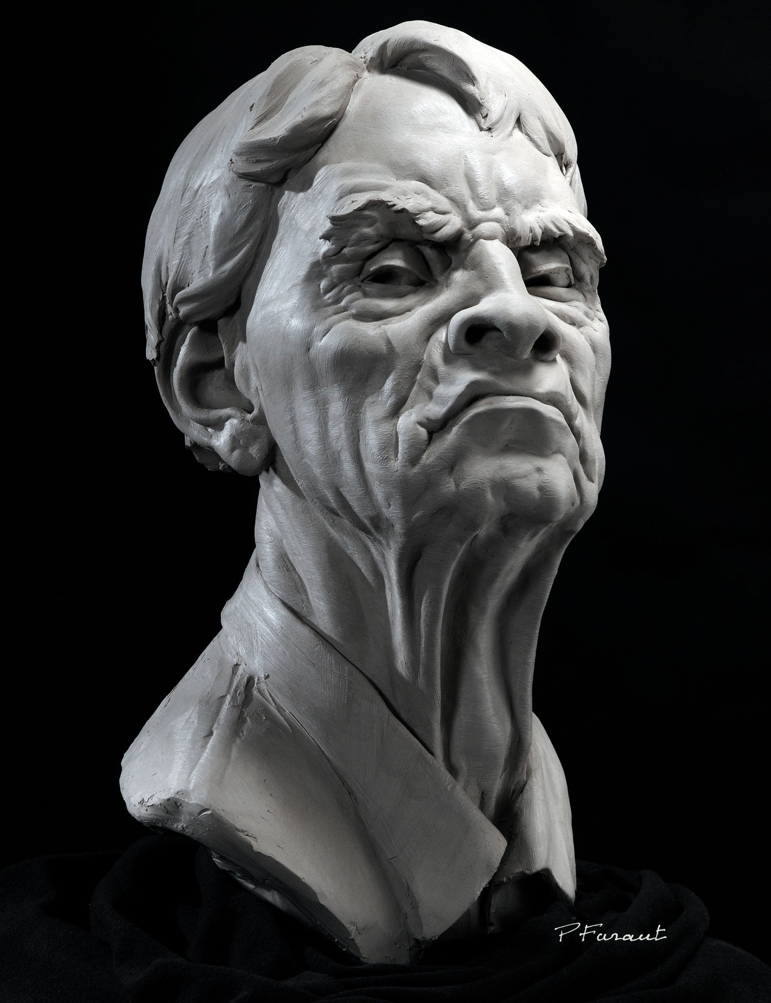 Clay portrait sculpture of an art critic with expression of disdain by Philippe Faraut