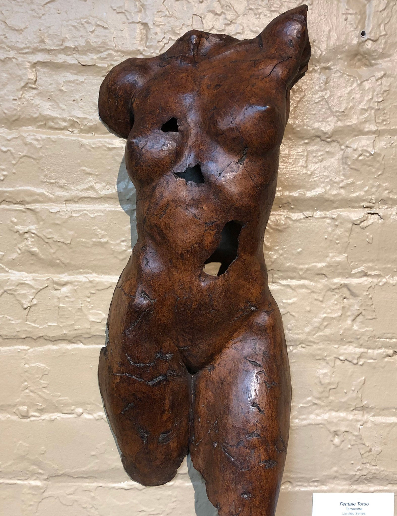 Fragmented terracotta female torso sculpture with wood-type patina by Philippe Faraut 