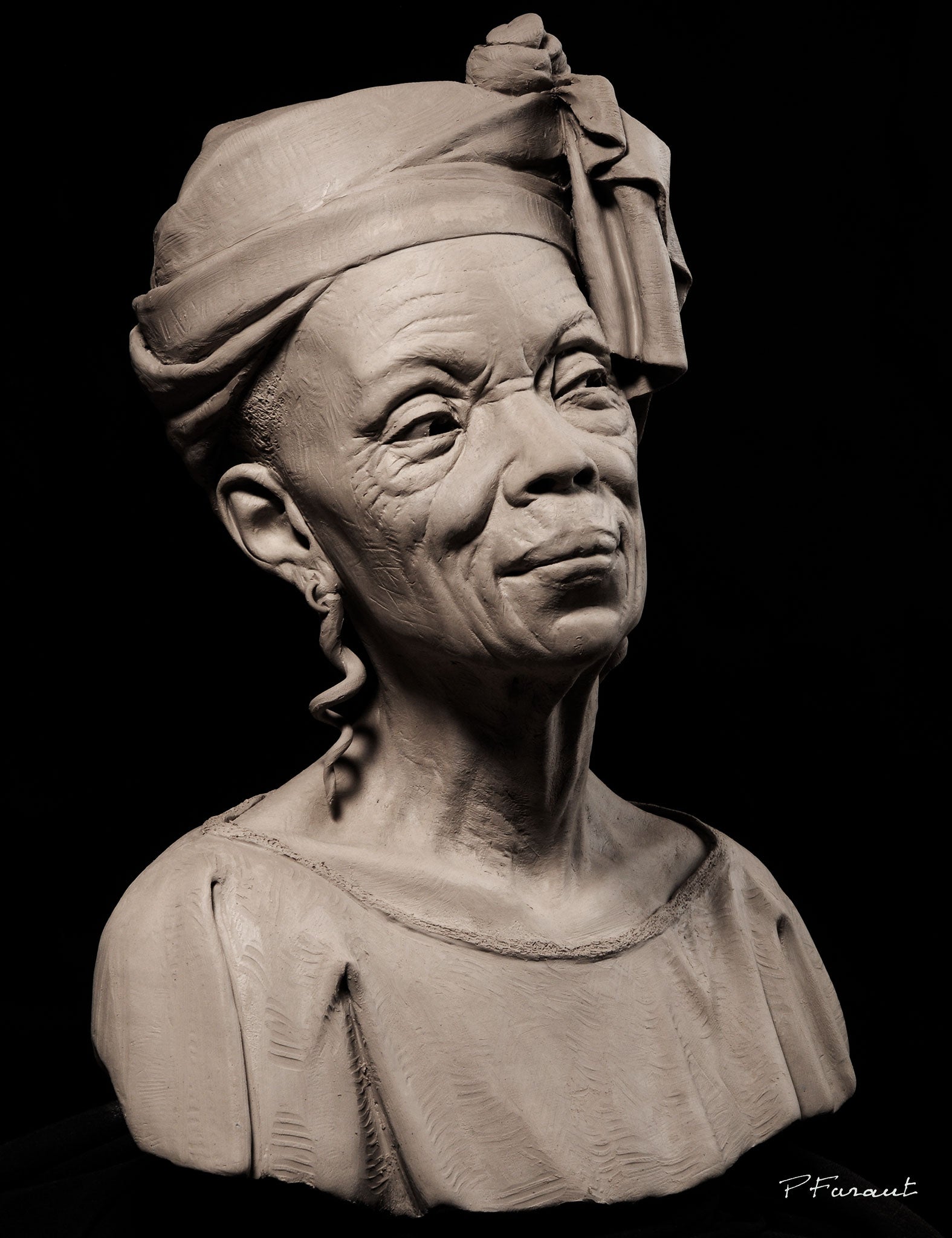 clay bust of elderly black woman dressed for church Sunday Morning by Philippe Faraut